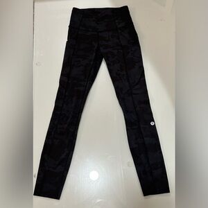 Black Camo lululemon pants in size 2, and 25” length.